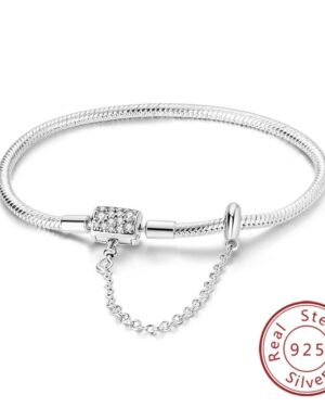 Silver pave bar clasp charm bracelet with sparkling crystal details, safety chain, polished snake chain, and 925 sterling silver design.