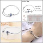 Silver Moon Star Charm Bracelet (2) Silver moon star charm bracelet with blue crescent moon, sparkling stars, crystal accents, safety chain, size guide, display view, and wrist view.