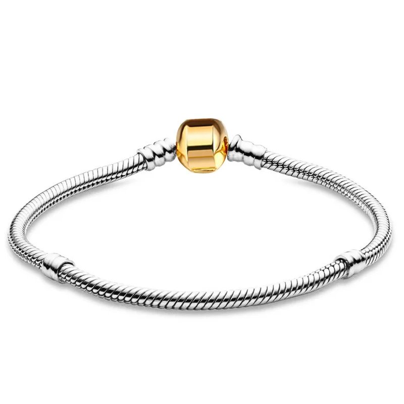 Silver snake chain charm bracelet featuring a polished gold-tone barrel clasp and raised stopper details.