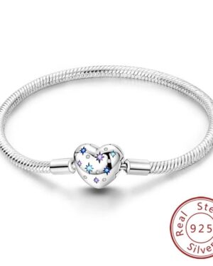 Silver starry heart charm bracelet with blue and purple star details, sparkling crystal accents, heart clasp, and polished snake chain.