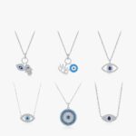 Aziza evil eye CZ necklace collection featuring silver-tone blue evil eye, Hamsa hand, and crystal pendant designs