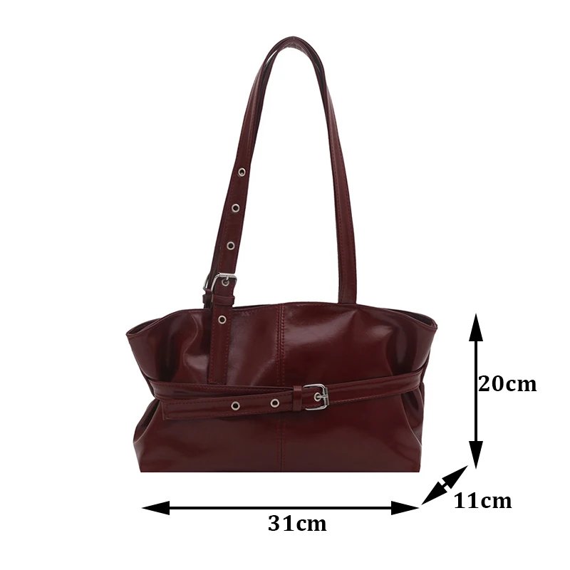 Burgundy Bexley Belted Shoulder Bag with dimensions of 31 cm wide, 20 cm high and 11 cm deep, with adjustable shoulder straps