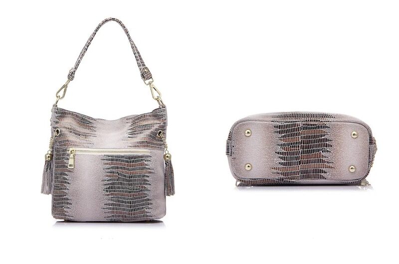 Beige alligator embossed women’s bucket bag shown from the back and bottom with exterior zipper pocket and protective metal feet