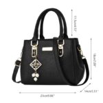 Camellia Pearl Charm Handbag-black (4) Black Camellia Pearl Charm handbag size guide showing 23 cm width, 18 cm height, 14 cm depth and 11.5 cm handle drop