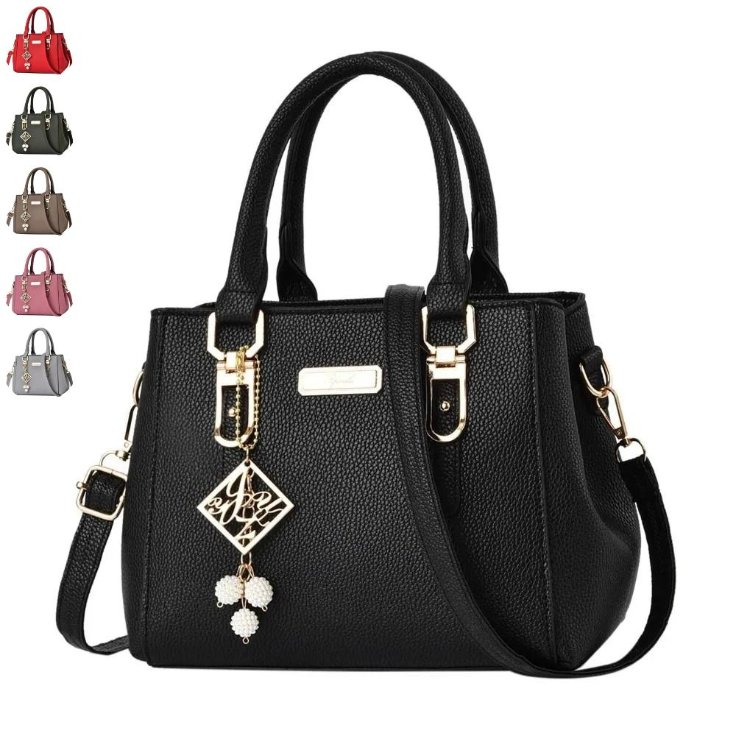 Camellia Pearl Charm Handbag Black Camellia Pearl Charm handbag with double top handles, detachable shoulder strap, gold tone hardware and decorative pearl charm