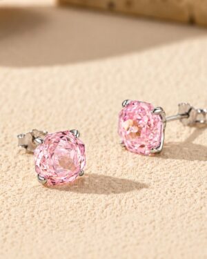 Cordelia pink CZ stud earrings with sparkling cushion-cut pink cubic zirconia stones, four-prong 925 sterling silver settings and butterfly backs.