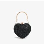 Cupid Rhinestone Heart Clutch (10) Front view of black rhinestone heart clutch bag with sparkling crystal embellishments and gold top handle