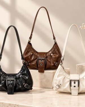 Dalton Retro Buckle Shoulder Bag collection in black, brown and white with curved shape, long shoulder straps and vintage buckle details