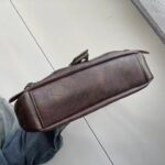 Bottom view of brown Dalton Retro Buckle Shoulder Bag showing the structured base, stitched edges and vintage-style finish