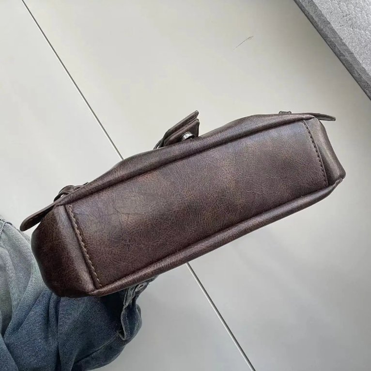 Bottom view of brown Dalton Retro Buckle Shoulder Bag showing the structured base, stitched edges and vintage-style finish