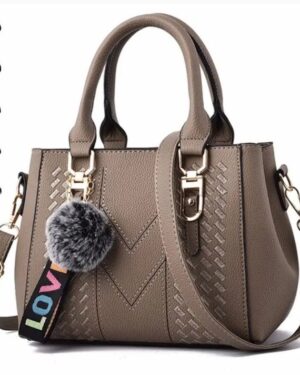 Taupe Darling Pom Pom handbag with double top handles, detachable shoulder strap, woven detailing and fluffy pom pom charm