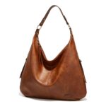 Delaney Large Hobo Bag-brown (3) Angled front view of brown Delaney Large Hobo Bag featuring textured leather-look material, curved opening, gold-tone rings and oversized design