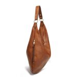 Delaney Large Hobo Bag-brown (4) Side view of brown Delaney Large Hobo Bag highlighting its slim profile, vertical zipper pocket, textured exterior and gold-tone shoulder strap attachments