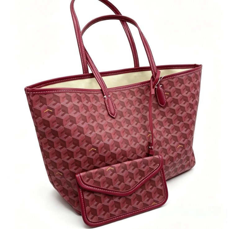 Angled view of burgundy Ellery Geometric Print Tote Bag with matching detachable pouch, stitched shoulder handles and structured design