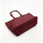 Bottom view of burgundy Ellery Geometric Print Tote Bag showing its rectangular base, geometric patterned fabric and reinforced seams