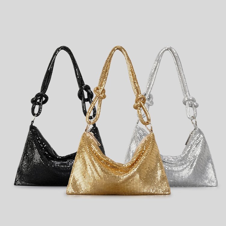 Gleam Metallic Mesh Evening Bag Metallic mesh evening bags for women in black, gold and silver with sparkling finish, knotted shoulder straps and slouchy design