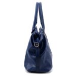 Side view of blue Linden soft hobo satchel bag showing structured base, double handles and shoulder strap attachment