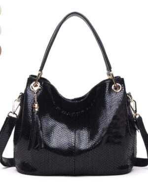 Black snake embossed hobo bag for women with double handles, adjustable shoulder strap, tassel charm, and gold tone hardware