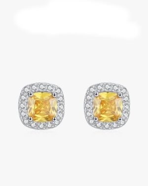 Marigold yellow CZ halo stud earrings with cushion cut yellow center stones surrounded by sparkling clear stones in silver settings.