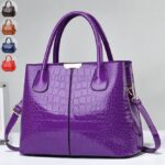 Purple Marlow croc embossed satchel bag with glossy finish, double top handles and detachable shoulder strap