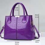 Purple Marlow croc embossed satchel bag showing 29.5 cm width, 21 cm height and 12.5 cm depth