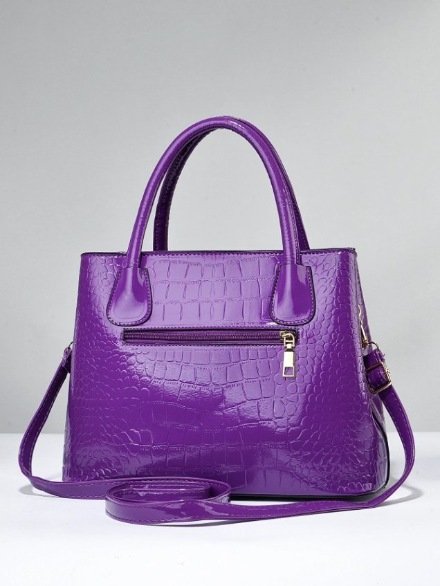 Back view of purple Marlow croc embossed satchel bag with exterior zip pocket and detachable shoulder strap