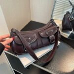 Quinn Double Pocket Shoulder Bag-coffee (2) Coffee brown Quinn Double Pocket Shoulder Bag displayed with two front flap pockets, buckle details, zip closure and shoulder strap