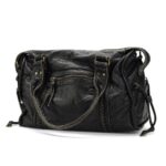 Reese Vintage Washed Shoulder Bag (12) Front view of black Reese Vintage Washed Shoulder Bag featuring slouchy silhouette, braided vertical panels, front zipper pocket and double carry handles