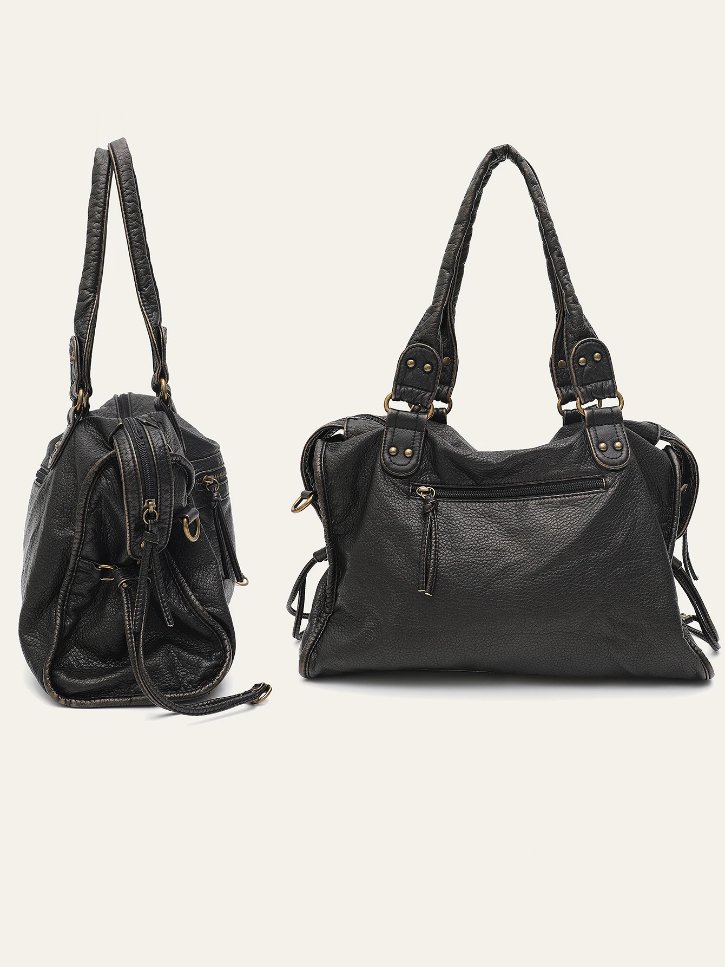 Black Reese Vintage Washed Shoulder Bag displayed from front and side angles, featuring double handles, zipper pockets and vintage-inspired gold-tone hardware