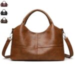Rowan Retro Crossbody Bag Brown Rowan retro crossbody bag with rounded top handles, detachable shoulder strap and stitched panel detailing