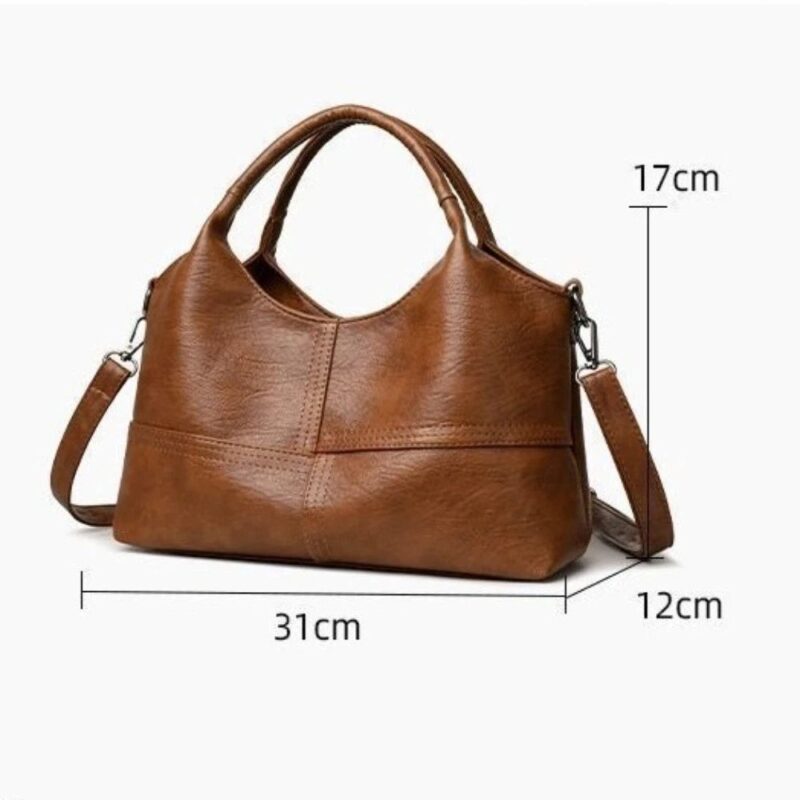 Brown Rowan retro crossbody bag with measurements showing 31 cm width, 17 cm height and 12 cm depth