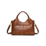 Rowan Retro Crossbody Bag-brown (8) Back view of brown Rowan retro crossbody bag with exterior zip pocket and detachable shoulder strap