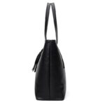 Side view of Sable black tassel tote bag showing slim handles, wide base and structured side profile