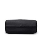 Bottom view of Sable black tassel tote bag showing wide flat base and reinforced centre stitching