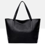 Back view of Sable black tote bag with long shoulder handles, smooth finish and clean minimalist design