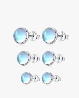 Three pairs of Selene moonstone stud earrings in different sizes, featuring luminous blue stones set in 925 sterling silver.