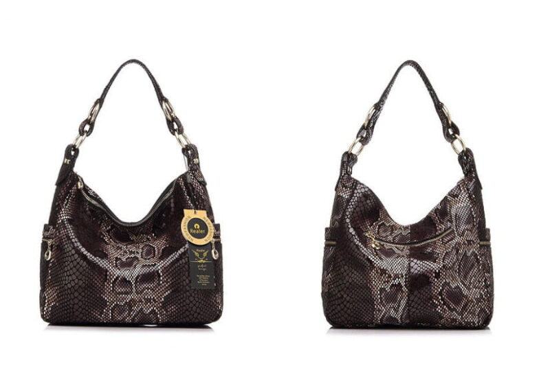 Black snake print hobo shoulder bag for women shown from the front and back with gold tone hardware and zipper pockets